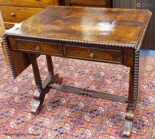 A 19th-century French rosewood sofa table, 86 cm wide with t...