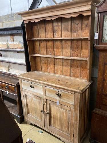 A Victorian pale pine kitchen dresser, length 124cm, depth 4...