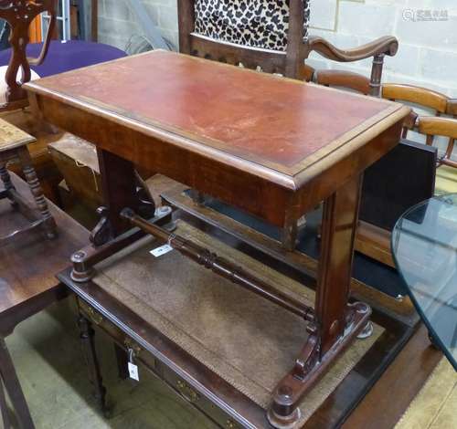 A Victorian mahogany writing table with two frieze drawers, ...