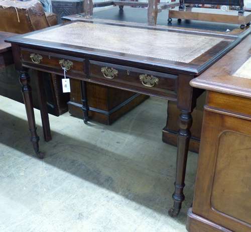 An Edwardian mahogany writing table, length 106cm