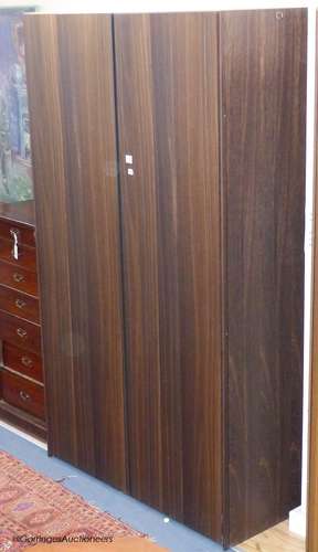 A Poliform Senzafine Stratus Spessart oak wardrobe, designed...