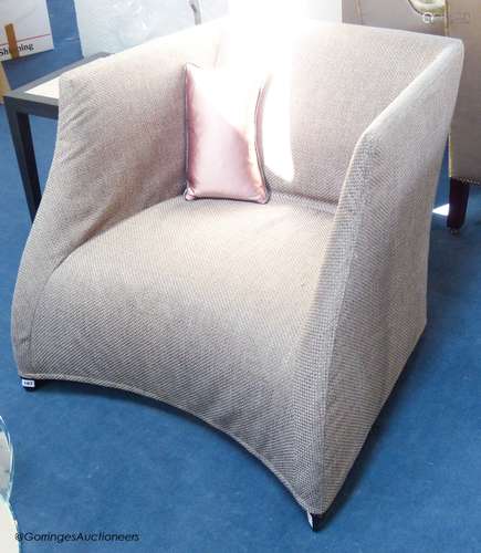 A contemporary upholstered armchairProvenance - a country es...