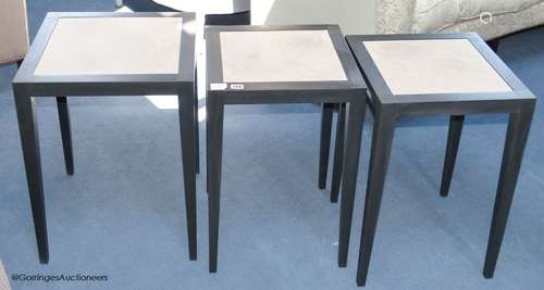 A pair of ebonised ash and parchment topped lamp tables, eac...