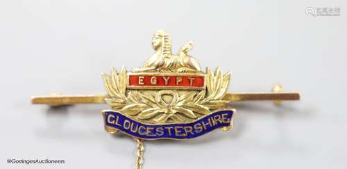 An early 20th century 9ct and enamel 'Egypt Gloucestershire'...