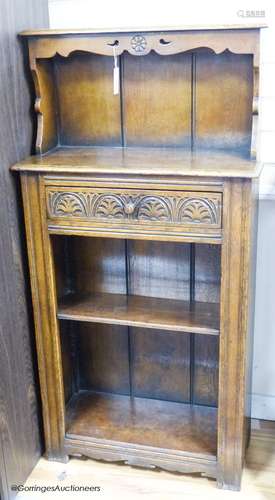 An ‘Ipswich oak’ narrow bookcase, 69 cm wide, 136 cm high, 2...