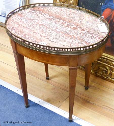 A Louis XVI style oval mahogany occasional table, marble top...