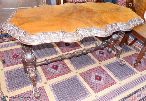 A Victorian figured walnut centre table, 104.5 cm long, 77 c...