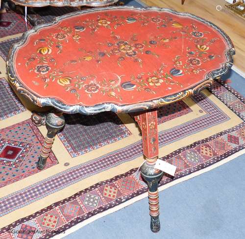 A 19th century Swiss painted folding table, 75 cm long, 56 c...