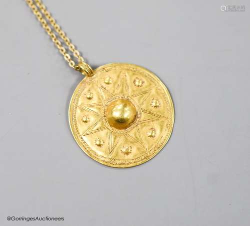 A modern Italian 18ct chain with a circular yellow metal pos...