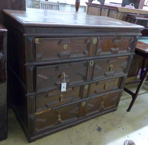 An early 18th century oak chest of four drawers, width 107cm...