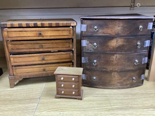 An 18th century Dutch inlaid walnut miniature chest of drawe...