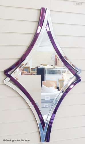 A Deknudt contemporary amethyst tinted mirror, 110 cm x 67.5...