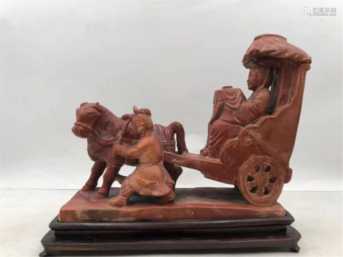 A SOAPSTONE CARVED FIGURES STORY TABLE DECORATION