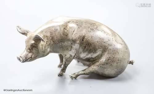 A modern silver miniature model of a seated pig, C.F.H & Co,...