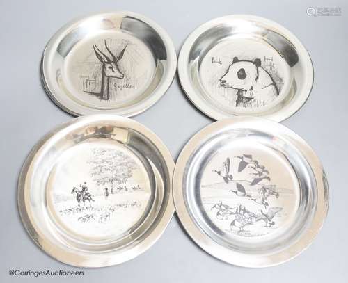 Four modern silver plates, two decorated with animals after ...