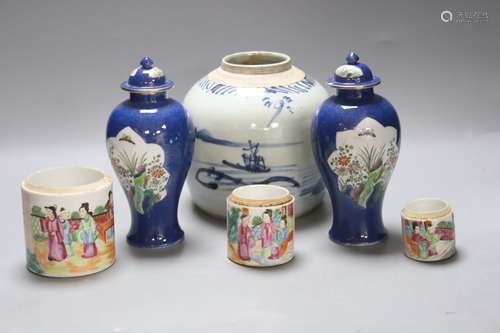 A Chinese jar, a pair of vases and three graduated brush pot...