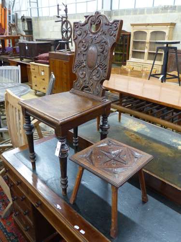 A late Victorian carved oak hall chair and a small occasiona...