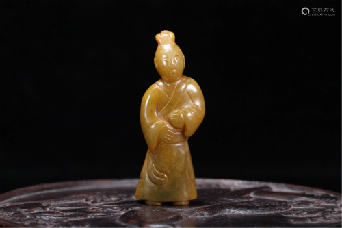 A CHINESE JADE CARVED FIGURINE