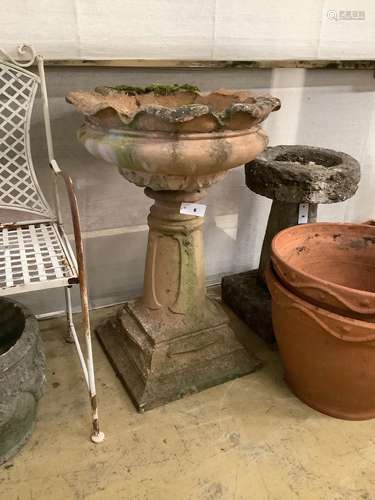 A reconstituted stone pedestal garden urn, height 83cm