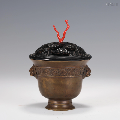 A CHINESE BRONZE INCENSE BURNER WITH BEAST HANDLES