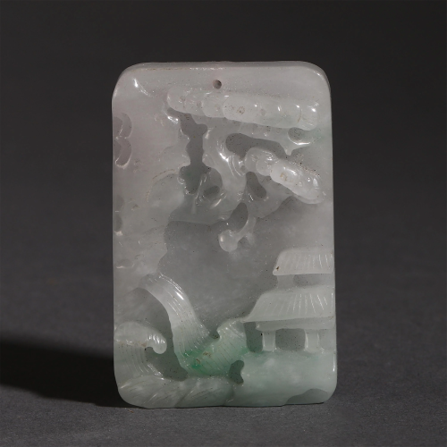 A CHINESE CARVED LANDSCAPE JADEITE PENDANT