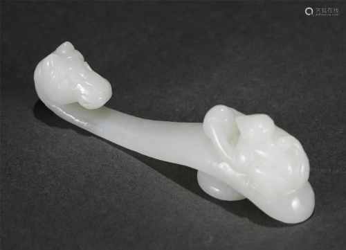 A CHINESE JADE CARVED BELT HOOK