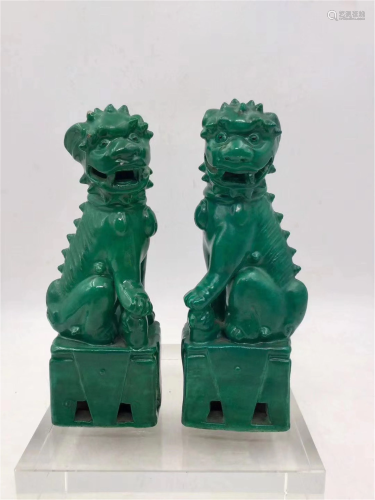 PAIR CHINESE GREEN GLAZED PORCELAIN LIONS