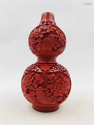 A CARVED RED LACQUER FLORAL DOUBLE-GOURDS VASE