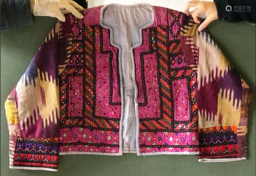 A GOOD ETHNIC MIRRORED JACKET, European, made up of Kutch an...