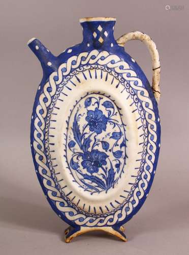 A BLUE & WHITE IZNIK POTTERY WATER URN - decorated with flor...