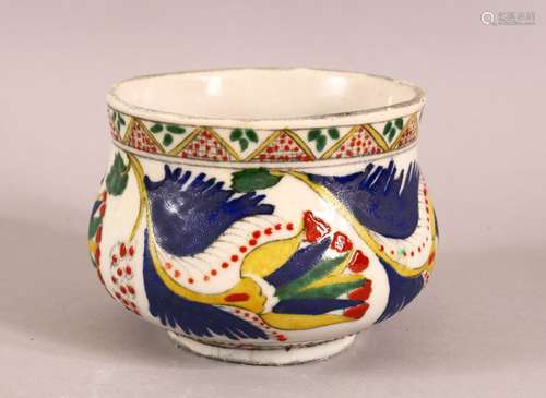 A TURKISH KUTAHYA POTTERY DECORATED BOWL - decorated with mu...