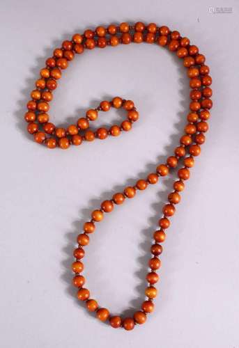 A RARE SET OF 19TH CENTURY CHINESE CARVED EXOTIC WOOD ROSARY...