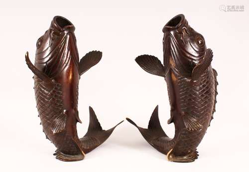 A MIRRORED PAIR OF JAPANESE MEIJI PERIOD BRONZE CARP FORMED ...