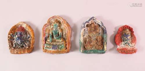 FOUR TIBETAN POTTERY MOULDED PANELS, each depicting a beast ...