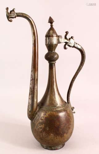 AN ISLAMIC SAFAVID TINNED COPPER EWER, the body with engrave...