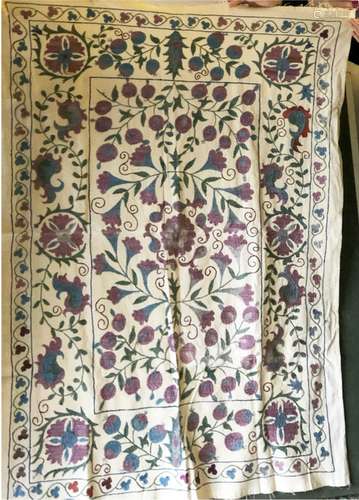 A FLORAL EMBROIDERED COTTON BEDSPREAD, 20th Century, Susani,...