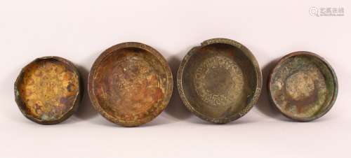A COLLECTION OF FOUR ISLAMIC POSSIBLY 13TH CENTURY BRONZE DI...