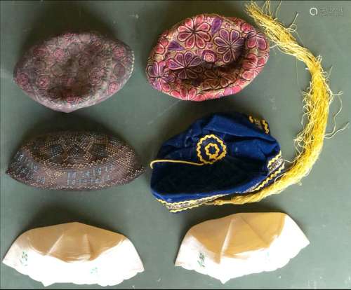 SIX ASSORTED EMBROIDERED HATS.