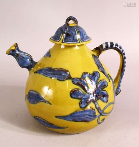 A CHINESE YELLOW GROUND GLAZED POTTERY TEAPOT AND COVER, the...