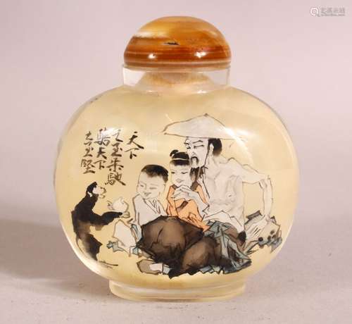 A CHINESE REVERSE PAINTED SNUFF BOTTLE - decorated with figu...