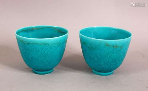 A PAIR OF CHINESE TURQUOISE GROUND TEA CUPS, decorated with ...