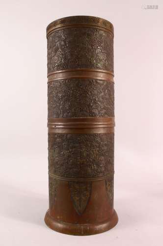 A LARGE JAPANESE CYLINDRICAL BRONZE RELIEF VASE, with profus...