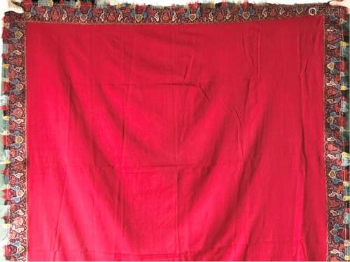 A FINE INDIAN SHAWL, the red central panel within a patchwor...