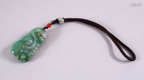 A SMALL CHINESE CARVED JADEITE PENDANT on string, pendant 6c...