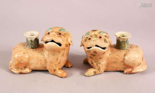 A PAIR OF 19TH / 20TH CENTURY CHINESE FAMILLE ROSE DOG CANDL...