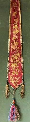 A CHINESE APRON SKIRT PANEL, Circa 1920, red silk with gold ...