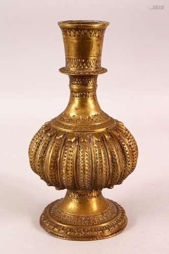 A 18TH / 19TH CENTURY INDIAN BRASS HUQQA BASE - with a ribbe...