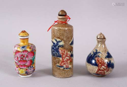 THREE CHINESE PORCELAIN SNUFF BOTTLES, one of floral design,...