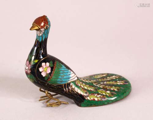 A CHINESE CLOISONNE ENAMEL MODEL OF A PEACOCK, 12cm.