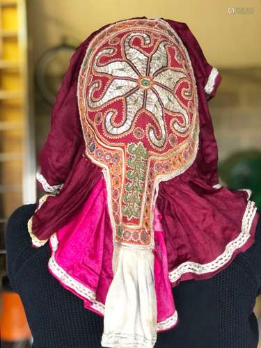 AN INDIAN METAL THREAD AND EMBROIDERED HEAD DRESS, 20th Cent...